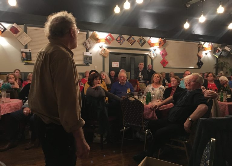 Man standing and singing